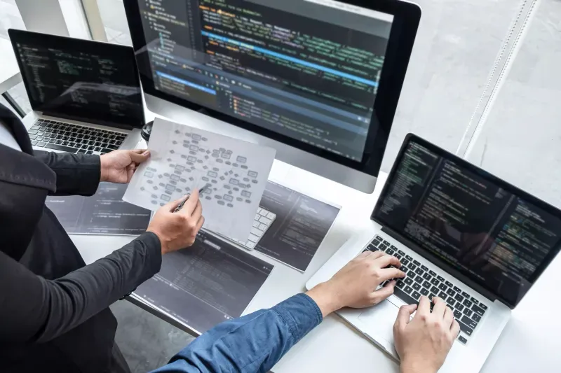 homepage display picture of code on background computer screen